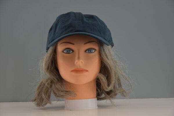 short gray chemo diva wig on mannequin head with hat