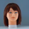 short red synthetic wig on mannequin head