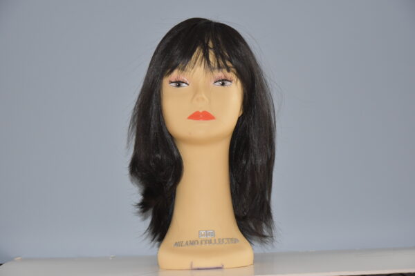 long black synthetic wig on mannequin head