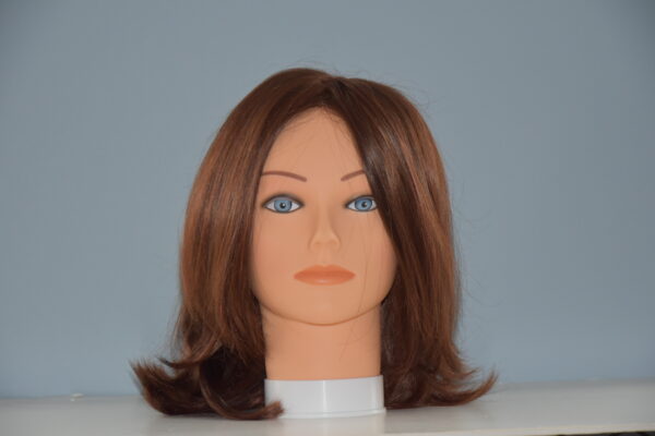 long red synthetic wig on mannequin head