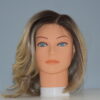 medium length synthetic wig on mannequin head