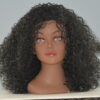 Long black curly synthetic wig on mannequin head