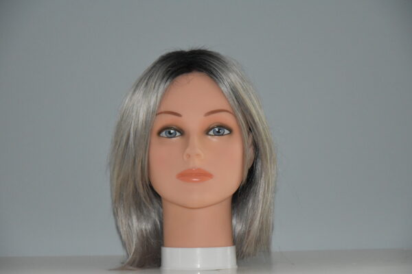 medium length gray synthetic wig on mannequin head