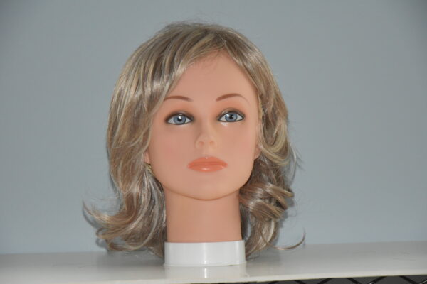 long blonde synthetic wig on mannequin head