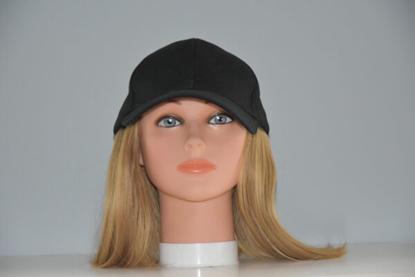 Medium length synthetic blonde wig attached to hat